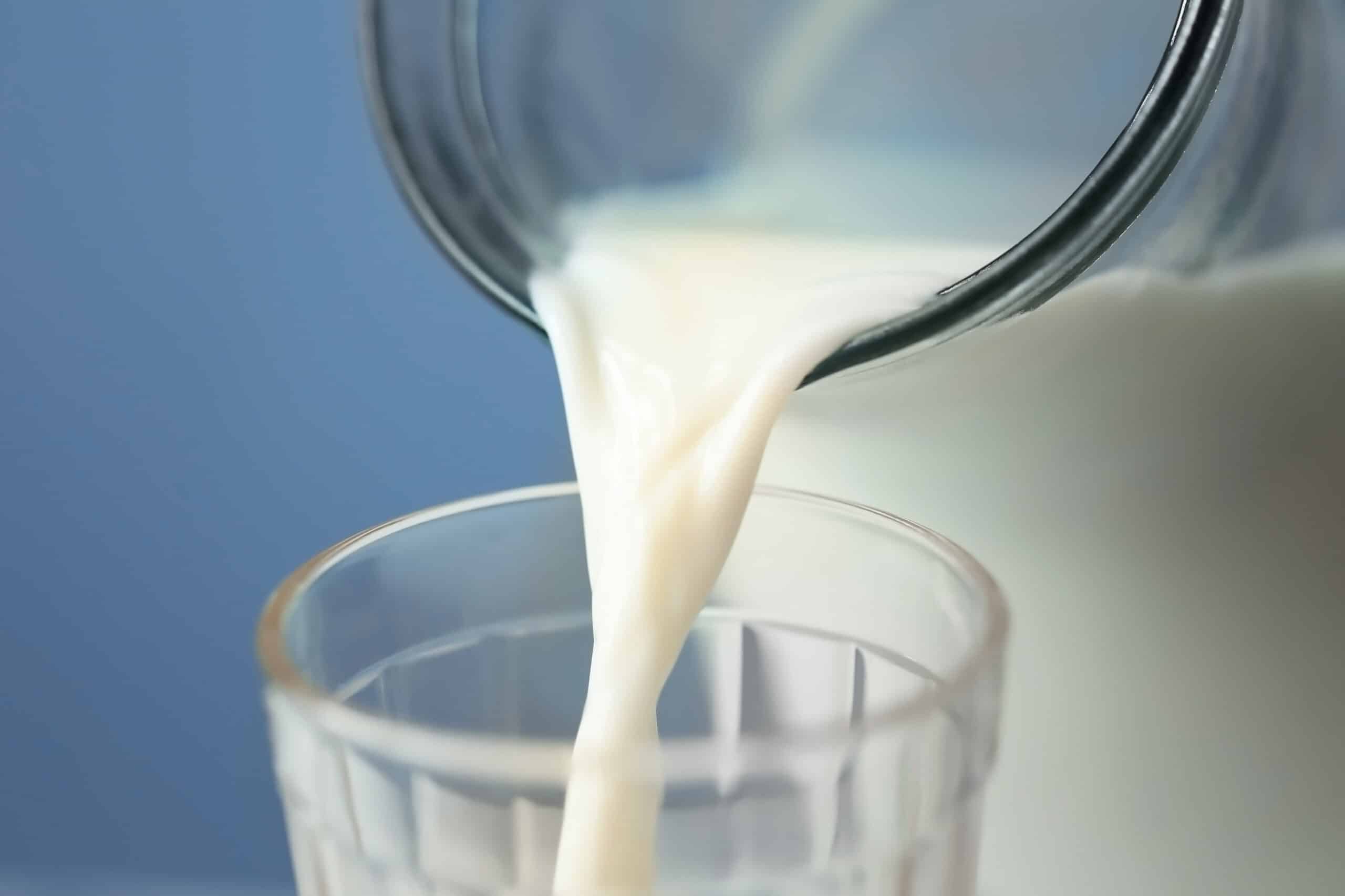 Milk pouring into a glass