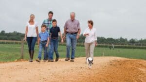 family walking at a dairy farm