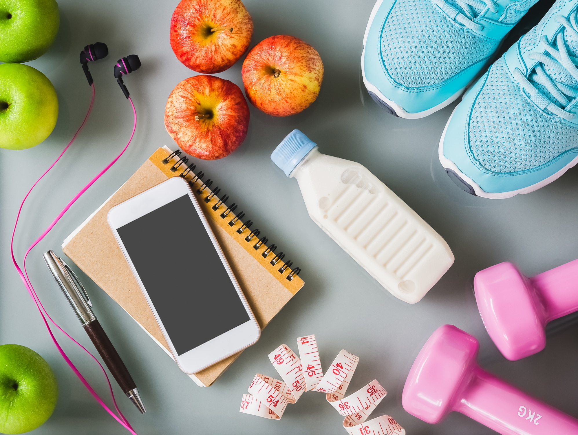 phone and milk with exercise equipment